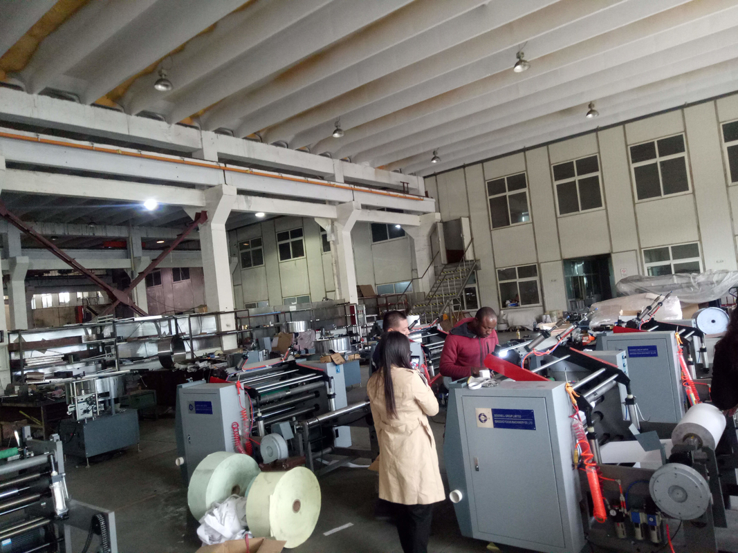 Inflatable Shaft and Flattening Roller Thermal Paper Slitting Machine for Smooth Operation